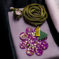 Green and purple flower choker